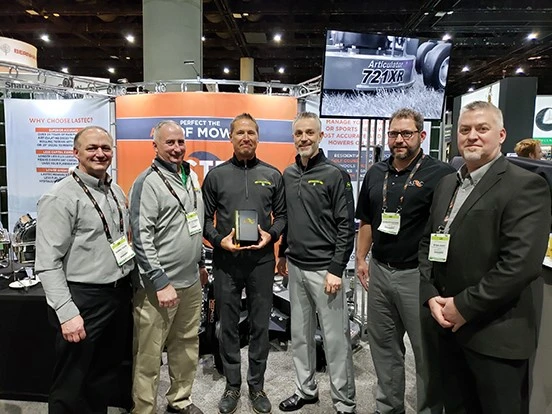 Reynolds Farm Equipment with Wood-Mizer North America President, Darryl Floyd (far left), Lastec North American sales sanager, Aaron Spoonemore (second from right) and Lastec U.S. sales director, Ryan Cheek (far right).