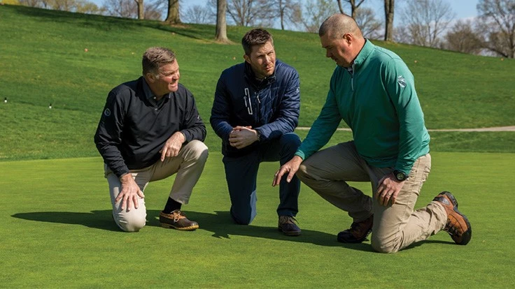 Bayer’s Darrin Batisky and Paul Giordano are key parts of Eric Materkowski’s professional network for turf stress and disease control.